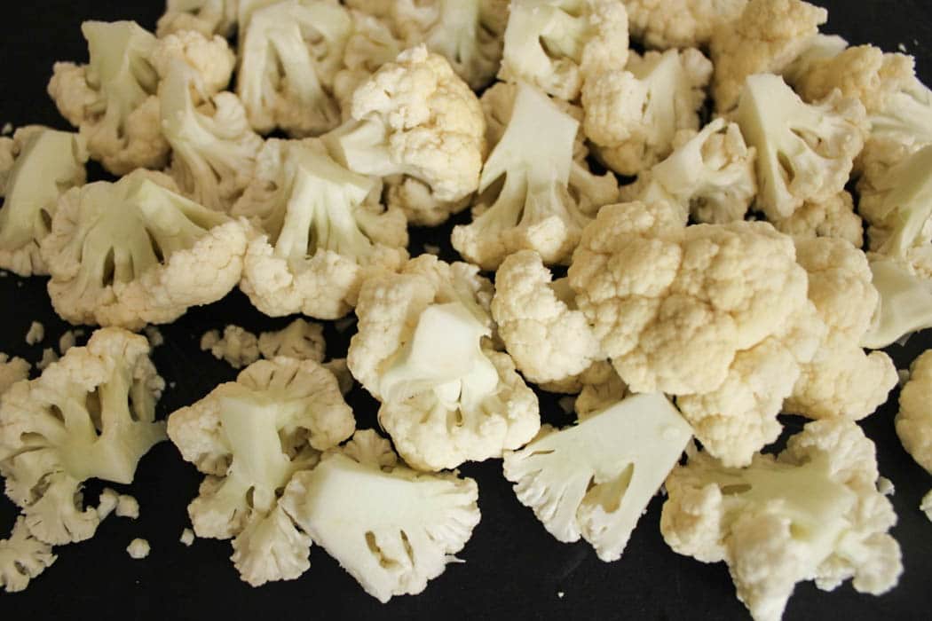 Chopped cauliflower florets for cauliflower pizza crust.