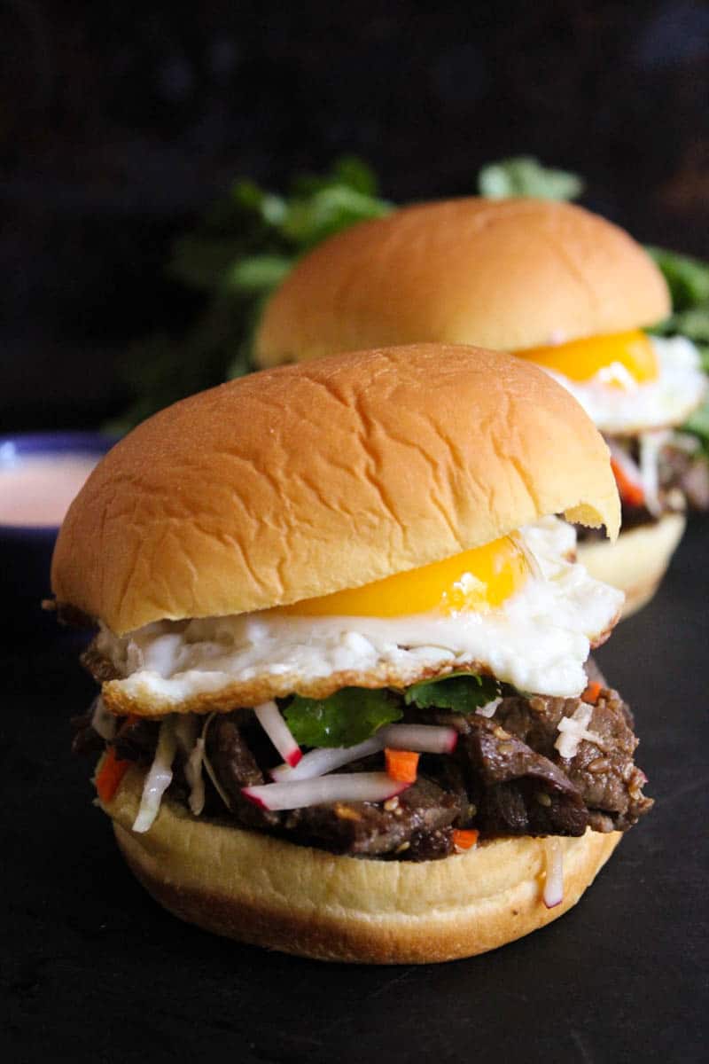 korean-steak-bulgogi-sandwiches-with-slaw-creamy-spicy-sauce-fried-eggs-7