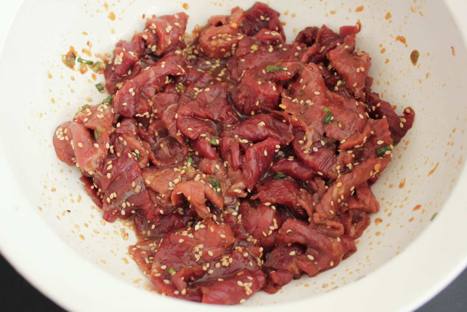 korean-steak-bulgogi-sandwiches-with-slaw-creamy-spicy-sauce-fried-eggs-step-3