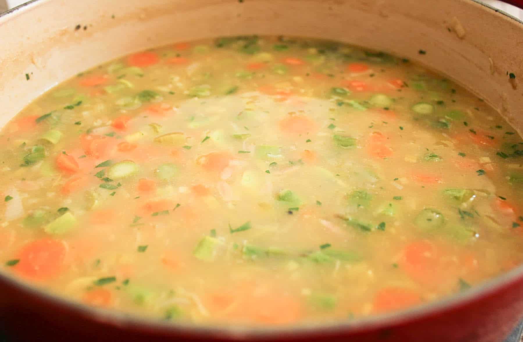 Lemon-orzo-soup-with-spring-vegetables-and-parmesan-step-6