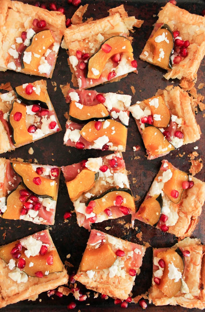 Acorn Squash Tart with Prosciutto and Pomegranate ready for serving.