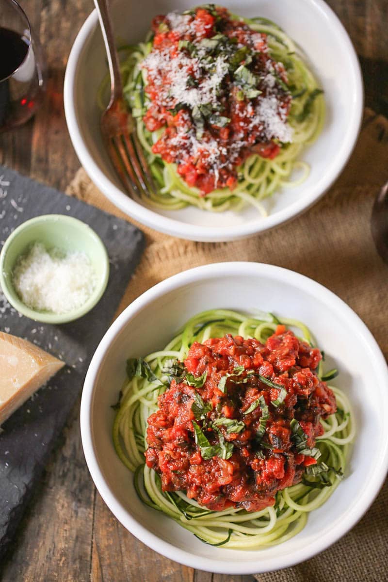 Zucchini Noodles with Portobello Bolognese garnished with Parmesan cheese