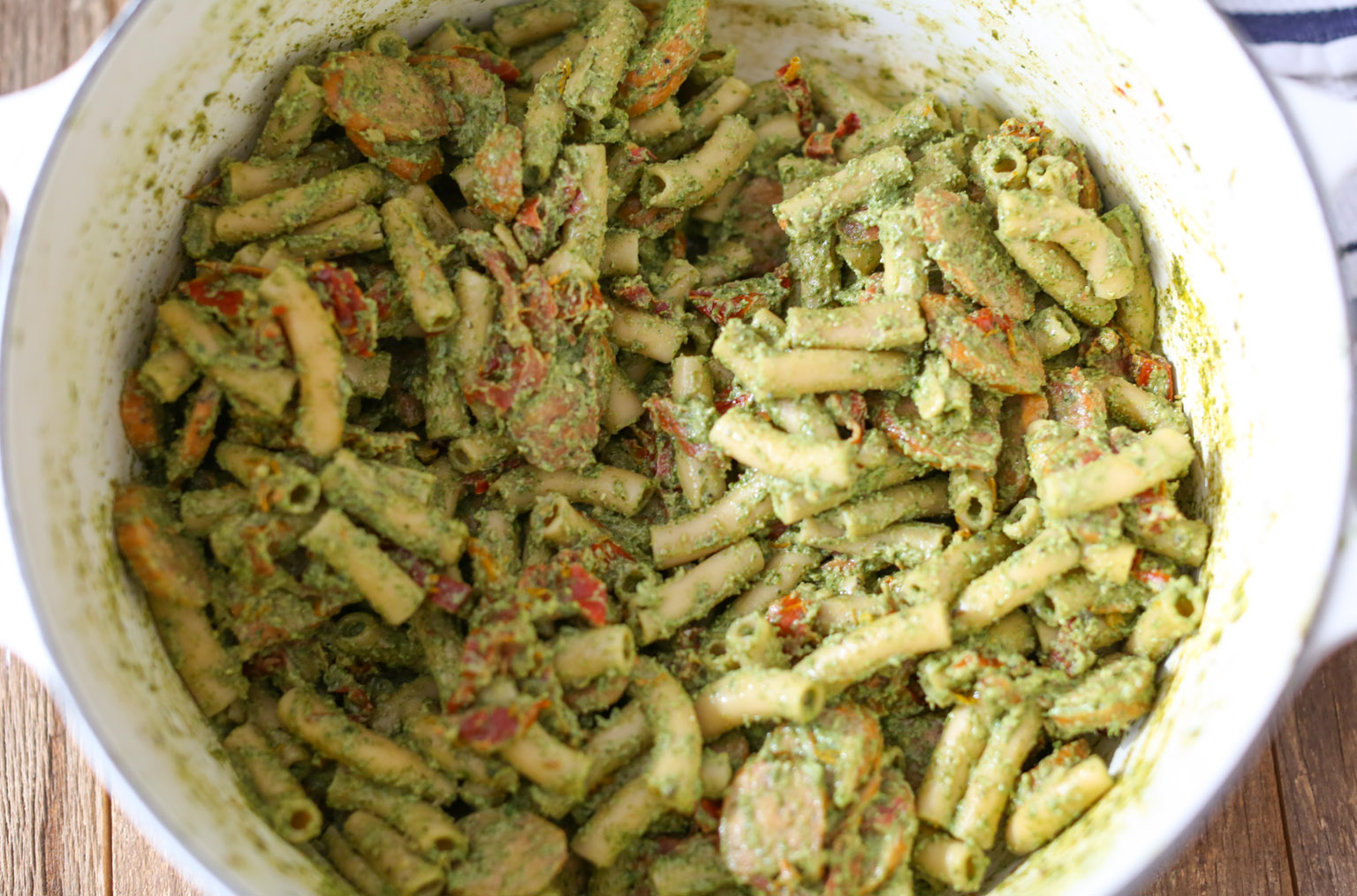 Sausage and Sun-Dried Tomato Pasta with Arugula-Goat Cheese Pesto