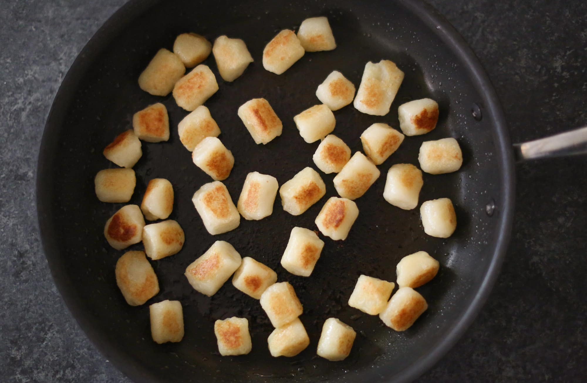 Skillet Cauliflower Gnocchi with Sausage and Spinach